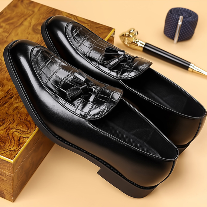 Polished men's tassel loafers with classic slip-on design. Sophisticated dress shoes for business casual wear.