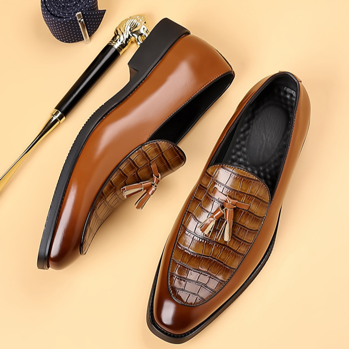 Comfortable men's polished tassel loafers. Elegant slip-on dress shoes, ideal for sophisticated style.