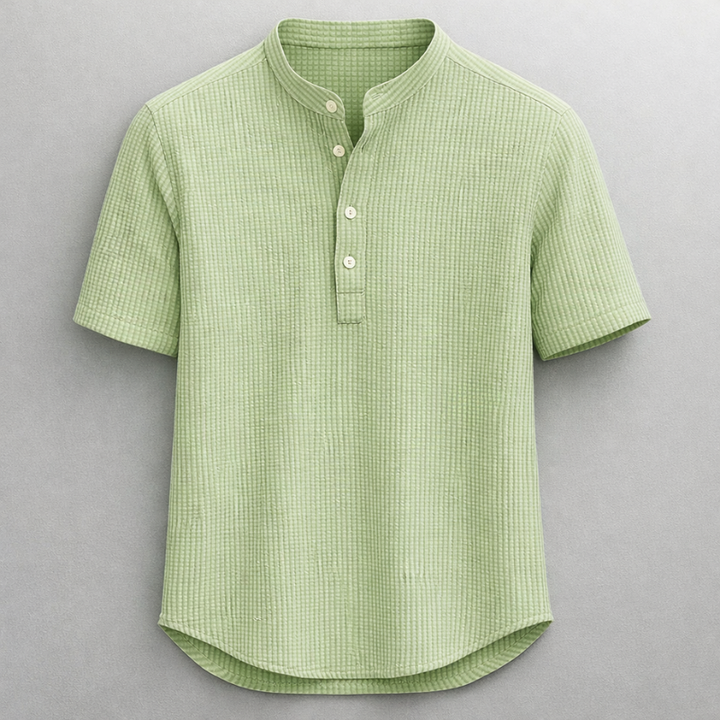 Tailored fit men's henley shirt, soft fabric, offering polished everyday style and comfort.