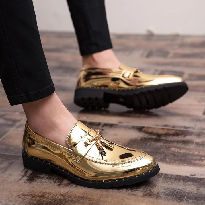 Sleek men's polished slip-on loafers, combining comfort and elegant style for formal wear.