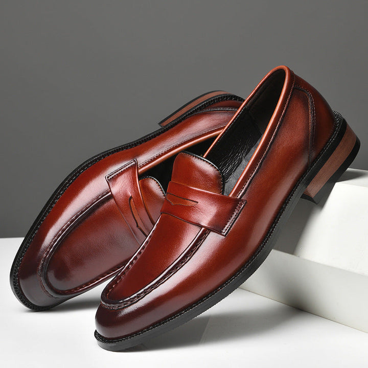 Classic men's slip-on dress loafers with a high-shine polished finish, ideal for formal footwear & men's fashion.