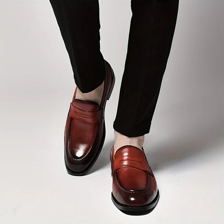 Elegant men's formal slip-on dress loafers, featuring a sleek polished finish for timeless classic style.