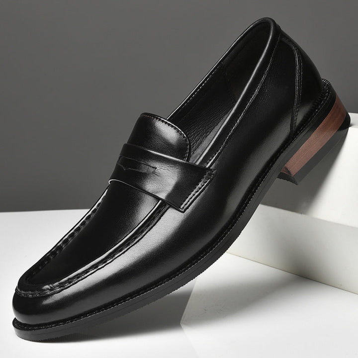 Polished black men's slip-on loafers, a classic choice for dress shoes, formal events, and refined men's fashion.