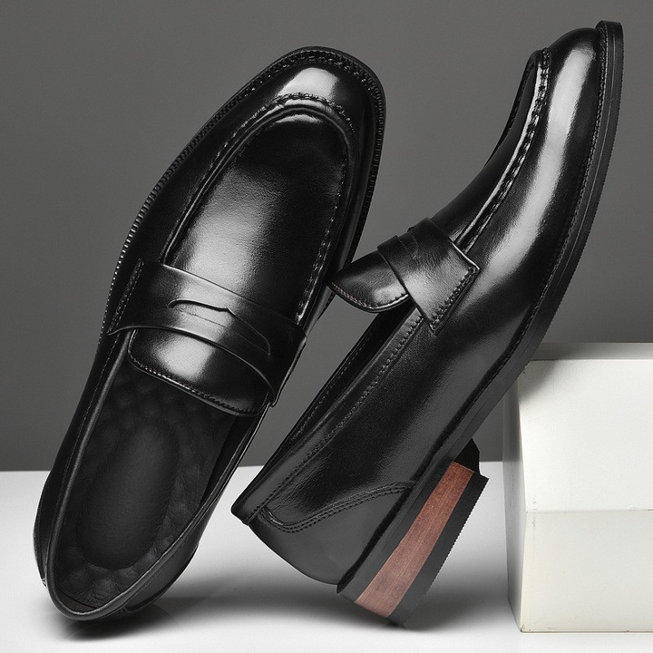 Stylish men's slip-on loafers with a high-shine polished finish, great for formal & casual elegant wear.