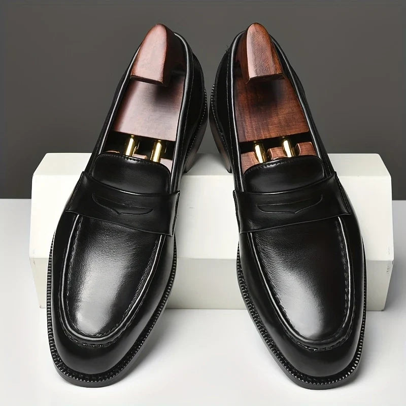 Sophisticated men's dress loafers, easy slip-on style with a polished finish, essential formal footwear.