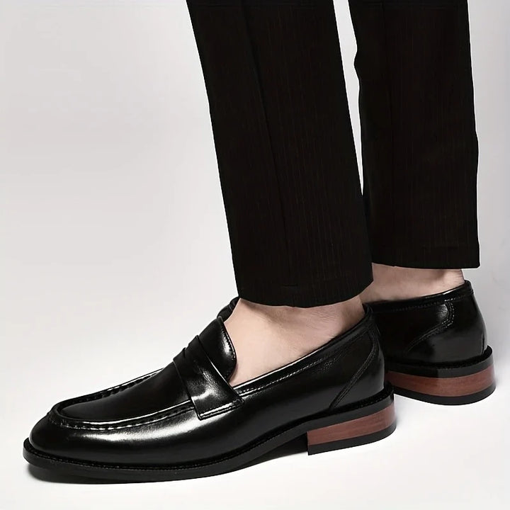 Versatile men's polished slip-on dress shoes, perfect for business meetings, formal wear, or elegant casual.