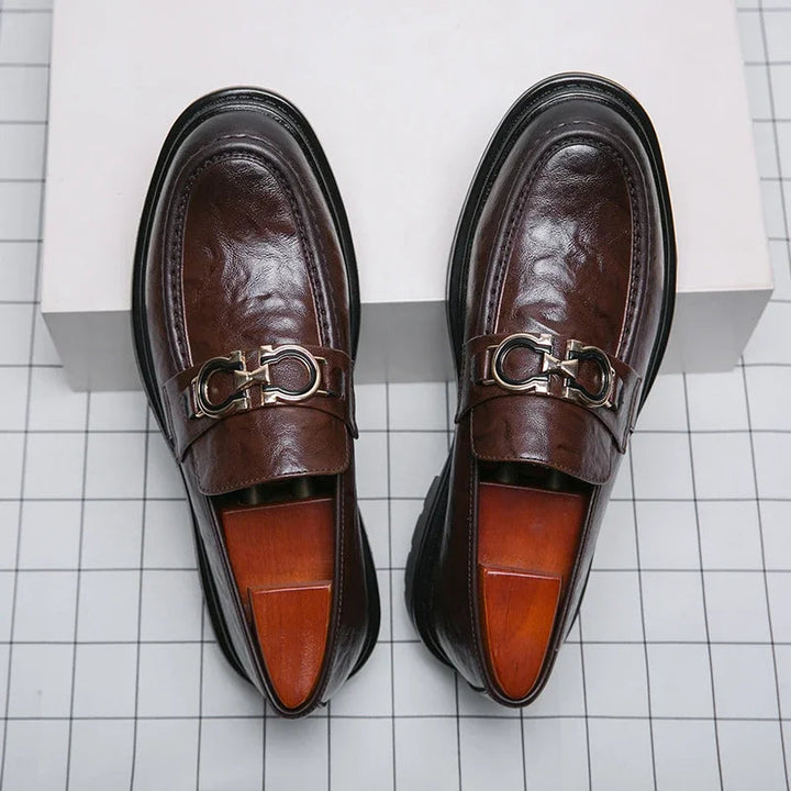 Classic men's loafers, polished finish and slip-on design for easy, confident style.