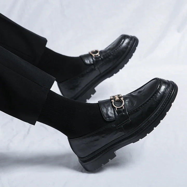 Classic men's slip-on dress shoes, polished for a sophisticated look.