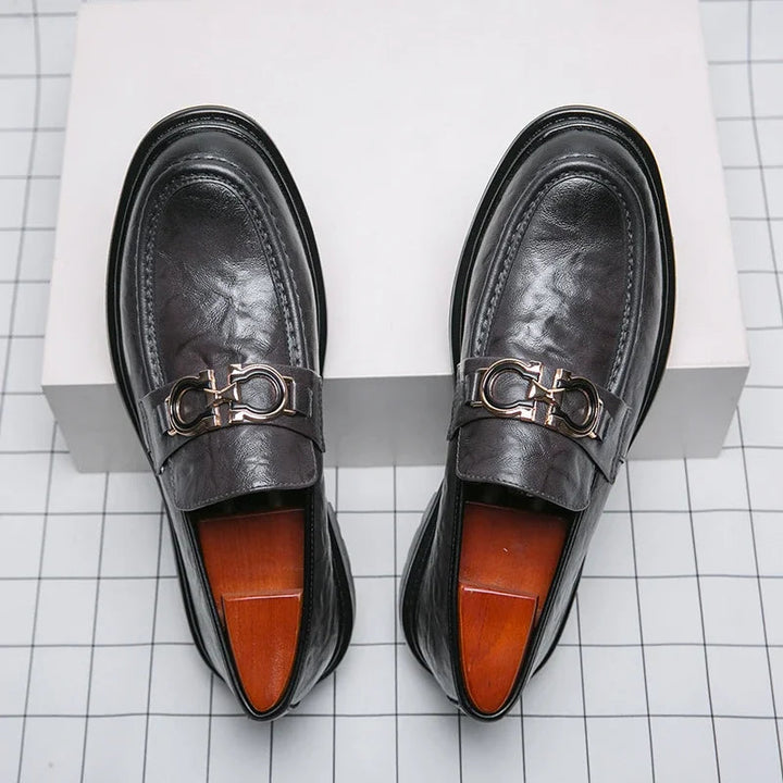 Confident men's style: polished slip-on loafers, merging comfort & class.