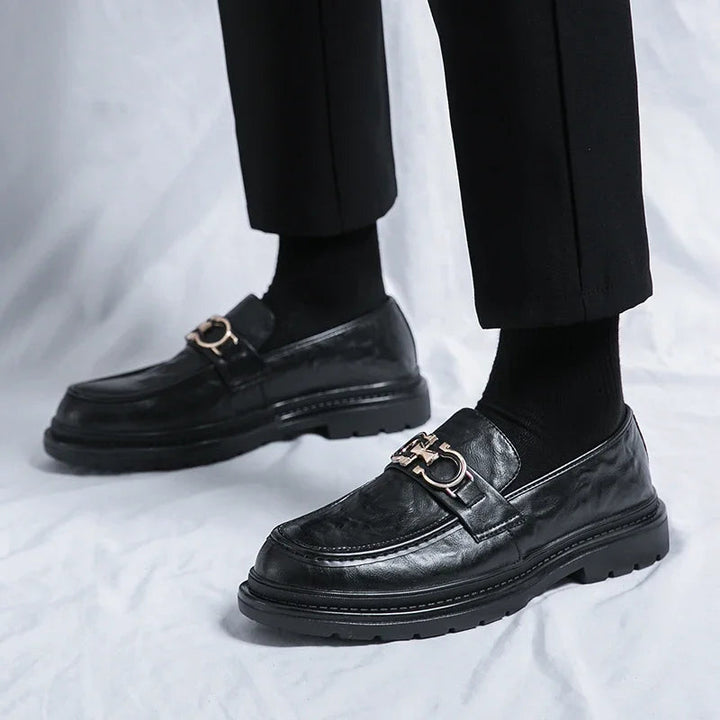 Formal men's slip-on shoes, polished to perfection for a commanding presence.