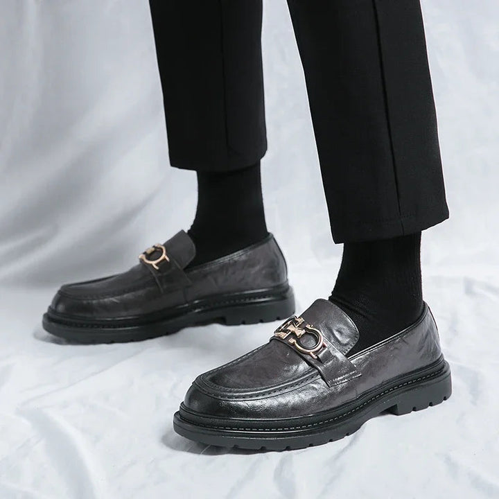 Polished men's dress loafers, offering comfort and a confident, classic look.