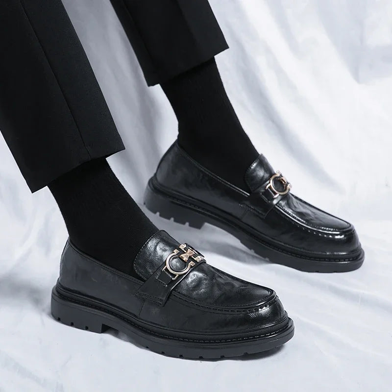 Polished black slip-on men's shoes, versatile for work & daily wear.