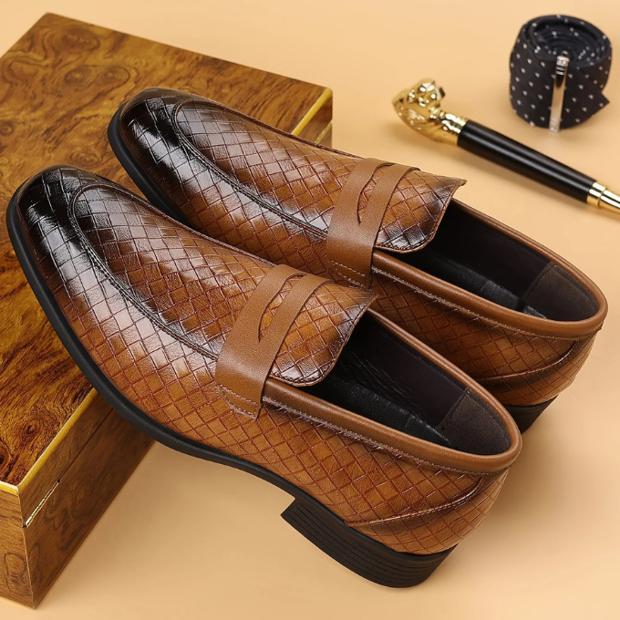 Sleek black polished woven slip-on loafers, ideal for dressy casual men's footwear.