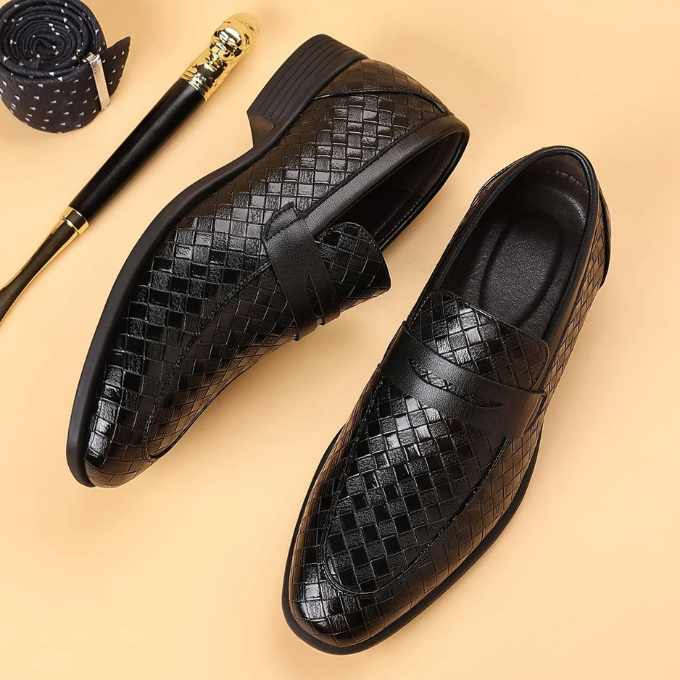 Stylish men's footwear: polished woven slip-on loafers for versatile smart casual outfits.