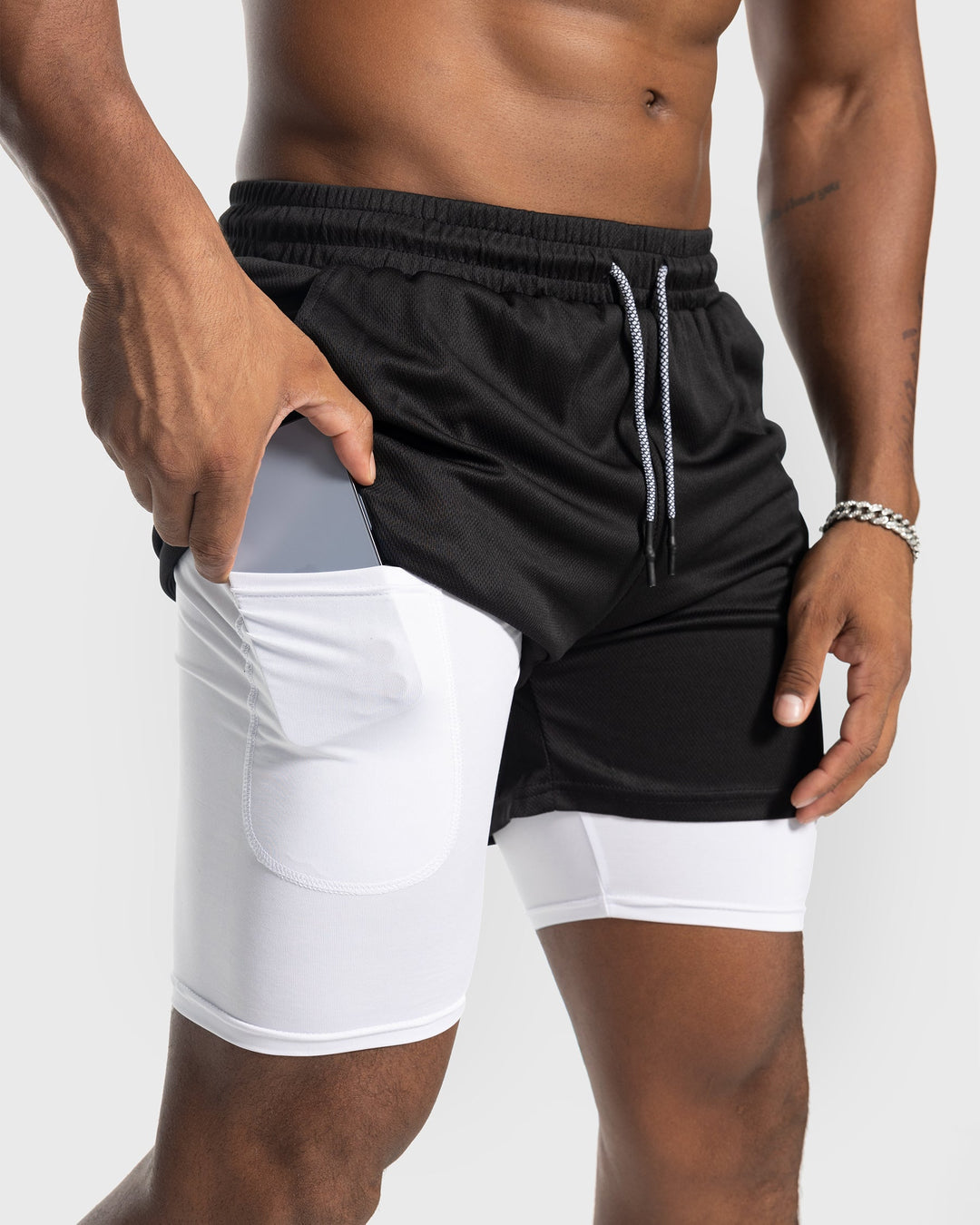 Men's Porto Kinetic performance shorts, featuring innovative mesh for superior mobility.
