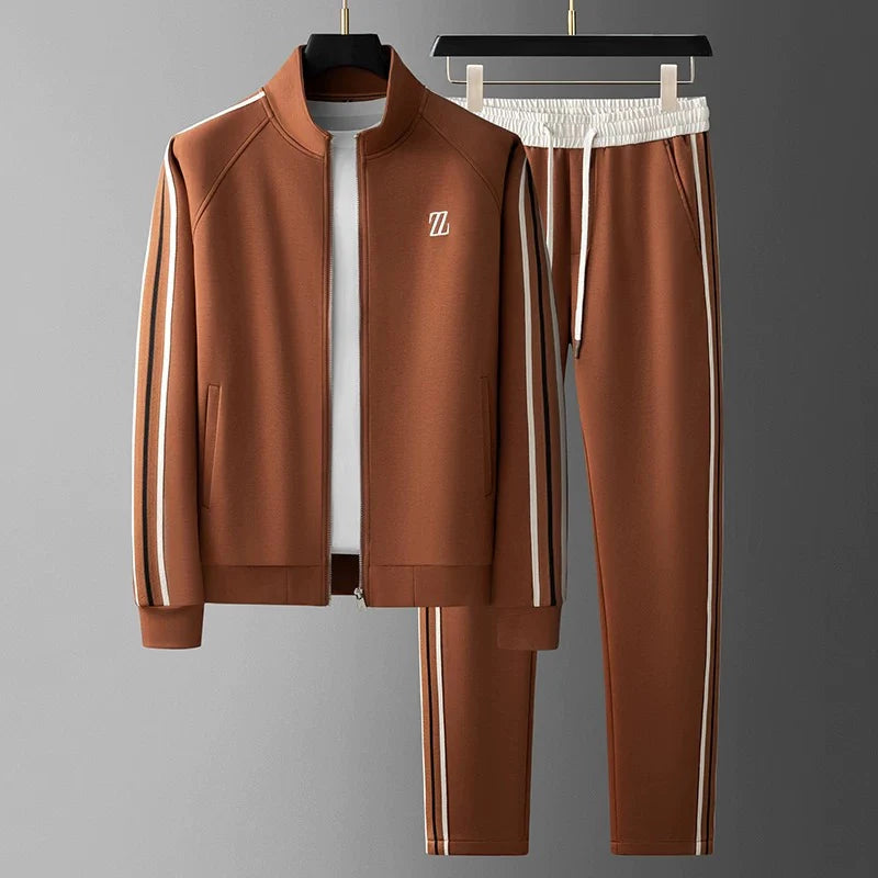 Men's fashion-forward athleisure tracksuit, ideal activewear or loungewear featuring a zip jacket and track pants.