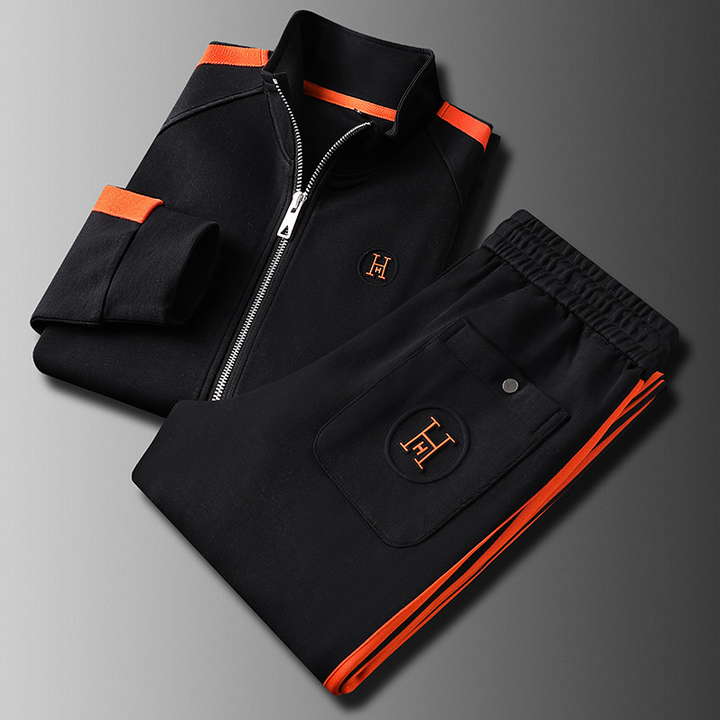 Navy men's sporty track jacket and joggers; premium comfort wear, perfect active outfit.