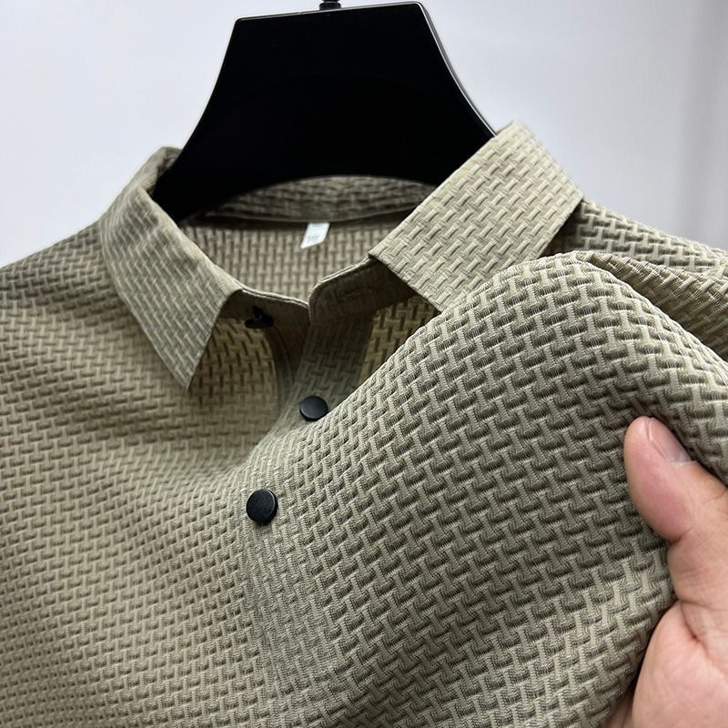 Premium men's short sleeve polo, breathable & moisture-wicking. Tailored for a sleek summer look.