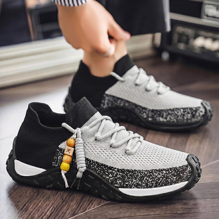 Men's premium comfort sneakers, brown with detailed stitching for everyday style.
