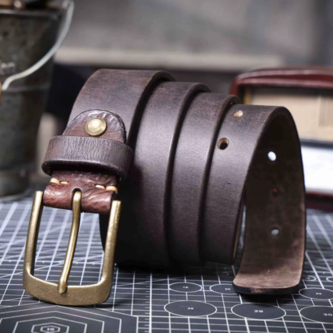 Rich brown hue of a men's premium cowhide leather belt, emphasizing its depth and luxurious feel.