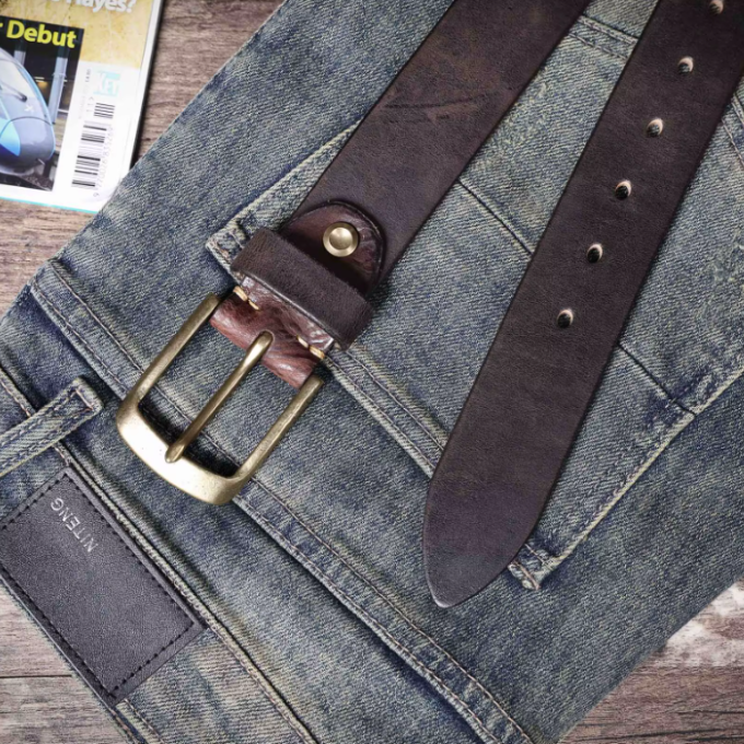 Built to last: A durable men's cowhide leather belt with a robust design and high-quality polished buckle.
