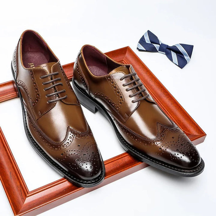 Sleek men's black leather brogue Oxford dress shoes, essential formal footwear for a timeless classic wardrobe.