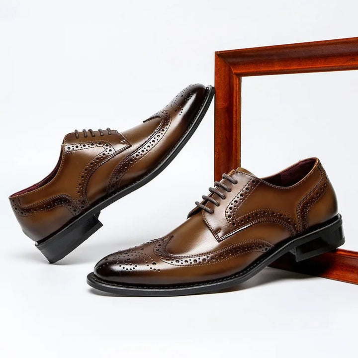 Men's premium leather brogue Oxford shoes, showcasing detailed craftsmanship & elegant formal design.