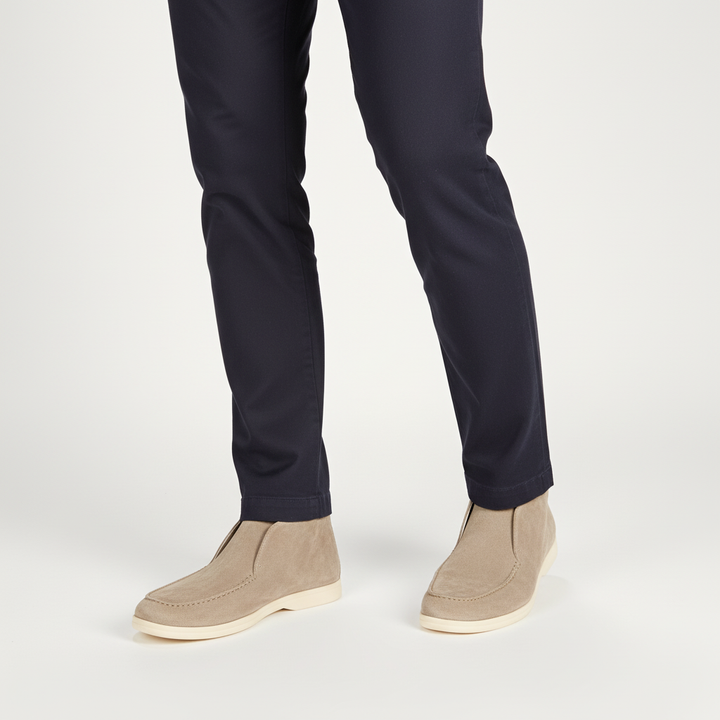 Pair of classic men's brown suede loafers, ideal for both casual and formal wear