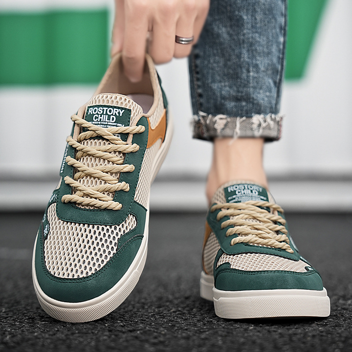 Lace-up athletic footwear for men, emphasizing premium comfort and modern style.