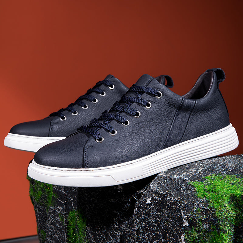 Premium men's comfort sneakers in blue and white, perfect for modern casual outfits.
