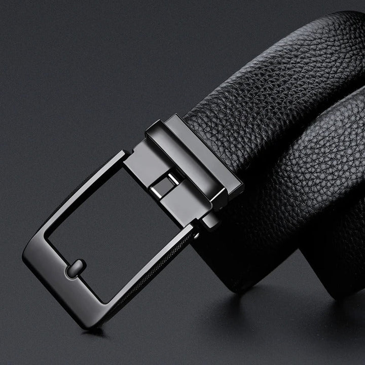 Durable men's cowhide leather belt showcasing a polished silver buckle, ideal for classic styles.