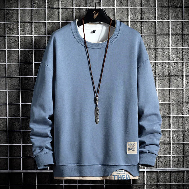 Men's premium dark grey comfort sweatshirt. Long sleeve, modern style for casual fall and winter wear.