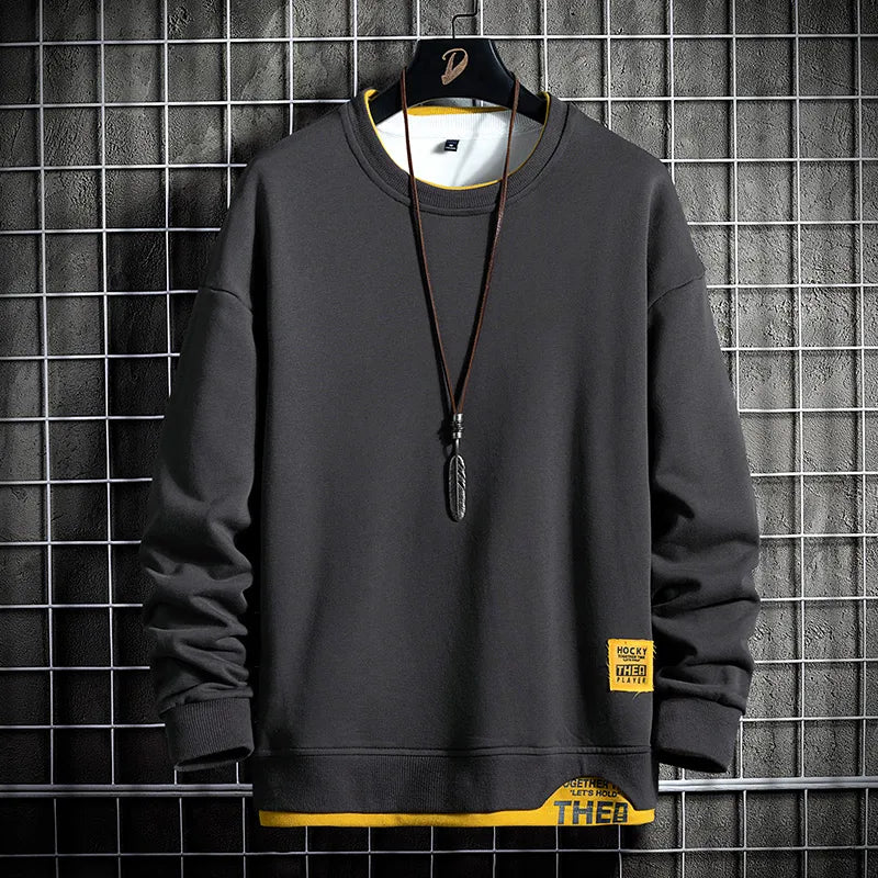 Black men's comfort sweatshirt, ideal for modern casual style. Perfect long sleeve layering piece for fall & winter.