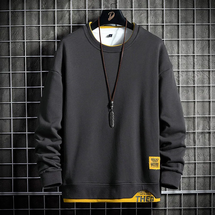 Black men's comfort sweatshirt, ideal for modern casual style. Perfect long sleeve layering piece for fall & winter.