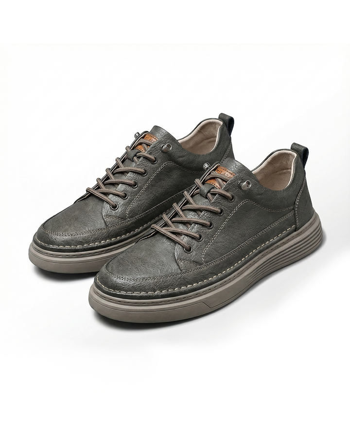 Men's premium genuine leather casual sneakers, stylish & durable for everyday fashion.
