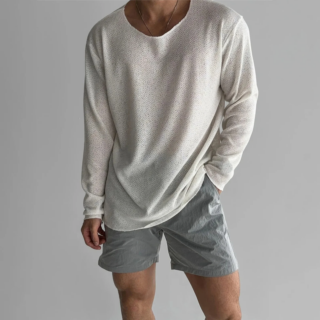 Close-up of a men's versatile lightweight pullover, showcasing its relaxed fit and premium fabric texture.