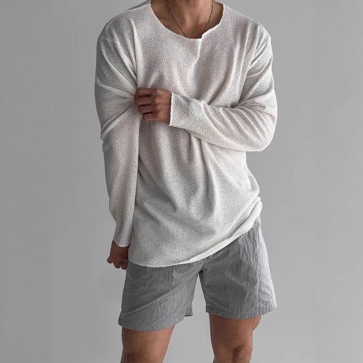 Man wearing a comfortable lightweight long-sleeve pullover, ideal for everyday casual wear and versatile styling.