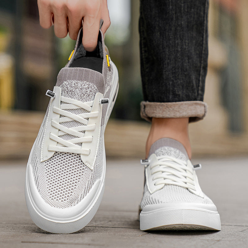 Navy men's lightweight walking shoes, featuring a cushioned sole for supreme comfort.