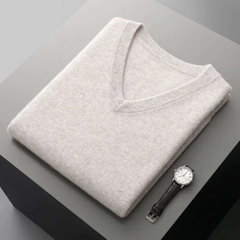 Elegant men's cashmere V-neck vest. A timeless luxury knitwear layering piece for refined casual & formal styles.