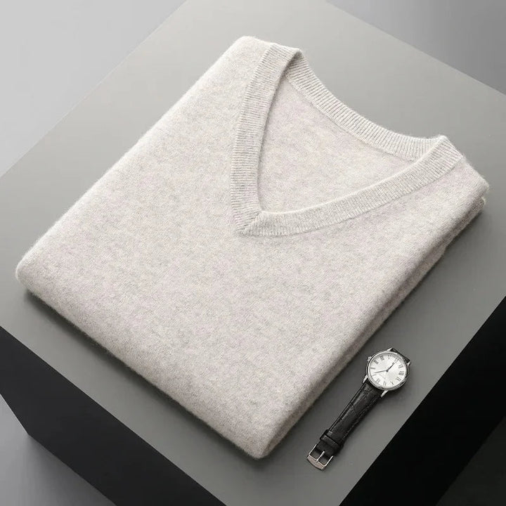 Elegant men's cashmere V-neck vest. A timeless luxury knitwear layering piece for refined casual & formal styles.