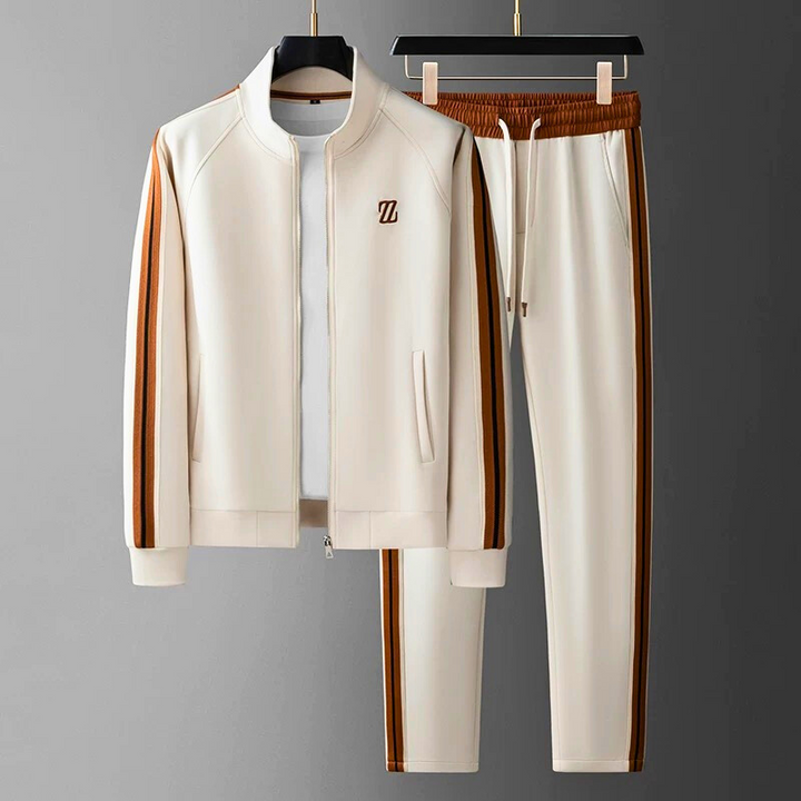 Close-up of men's full-zip sporty tracksuit jacket, part of a premium athletic wear jogger set.