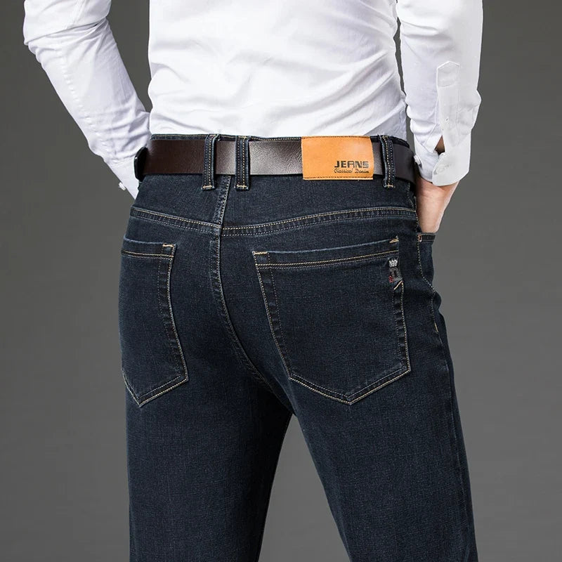 Stylish men's black stretch denim jeans, featuring a comfortable tailored fit, perfect for versatile men's fashion.