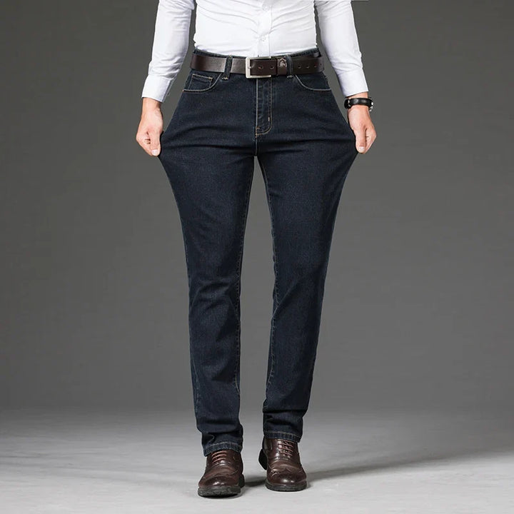 Durable men's blue stretch denim jeans, tailored for comfort & everyday wear, a versatile addition to men's fashion.