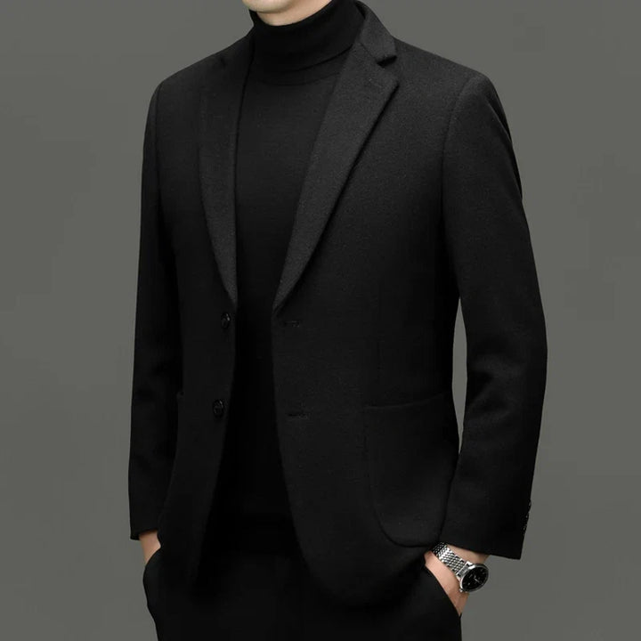 Man wearing a sharp tailored blazer, ideal professional attire for business meetings and formal events.