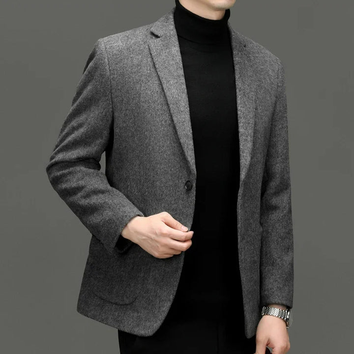Stylish men's tailored blazer, styled smart casual. Versatile for modern men's fashion and sophistication.
