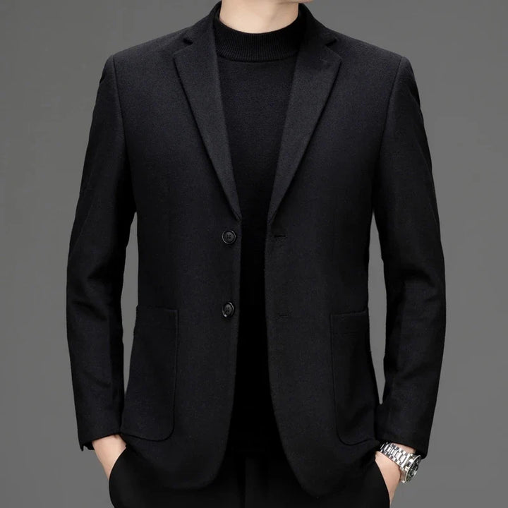 Detail of the elegant lapels and buttons on a premium men's tailored blazer, reflecting quality craftsmanship.