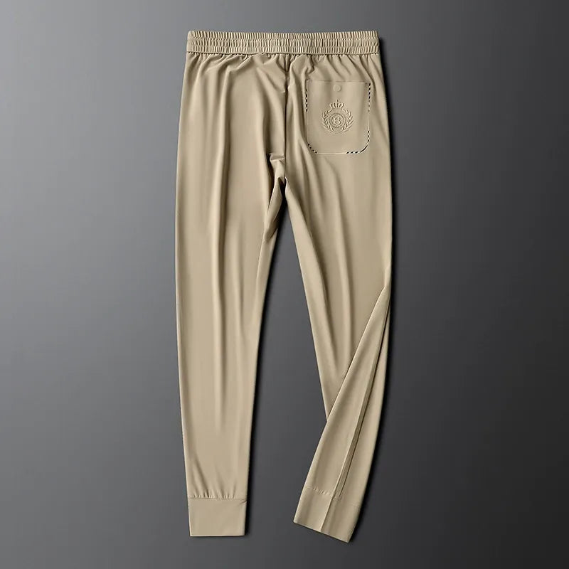 Elegant black men's tailored dress pants, essential for formal wear & business attire.
