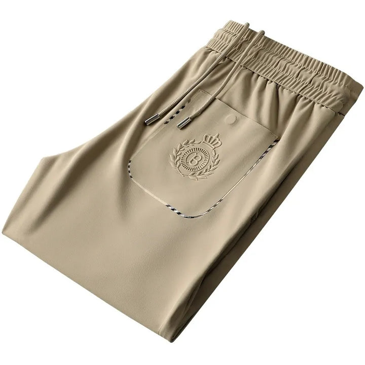 Crisp white men's premium tailored dress trousers, stylish for formal & smart casual outfits.