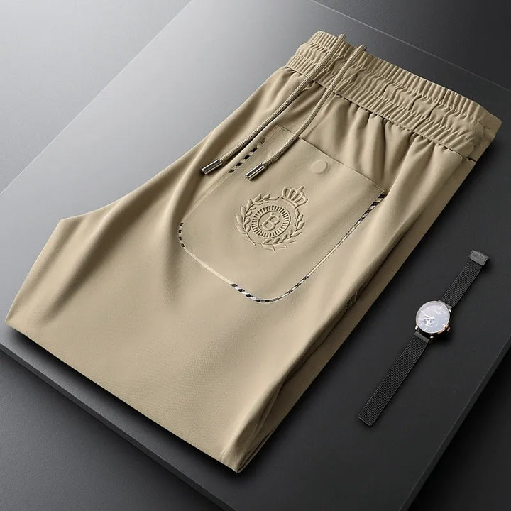 Sophisticated gray men's tailored dress trousers, suitable for office, business & formal occasions.