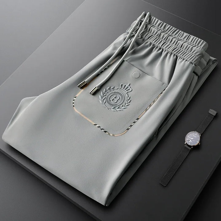 Close-up of men's premium tailored dress trousers, showcasing the perfect fit & quality fabric.